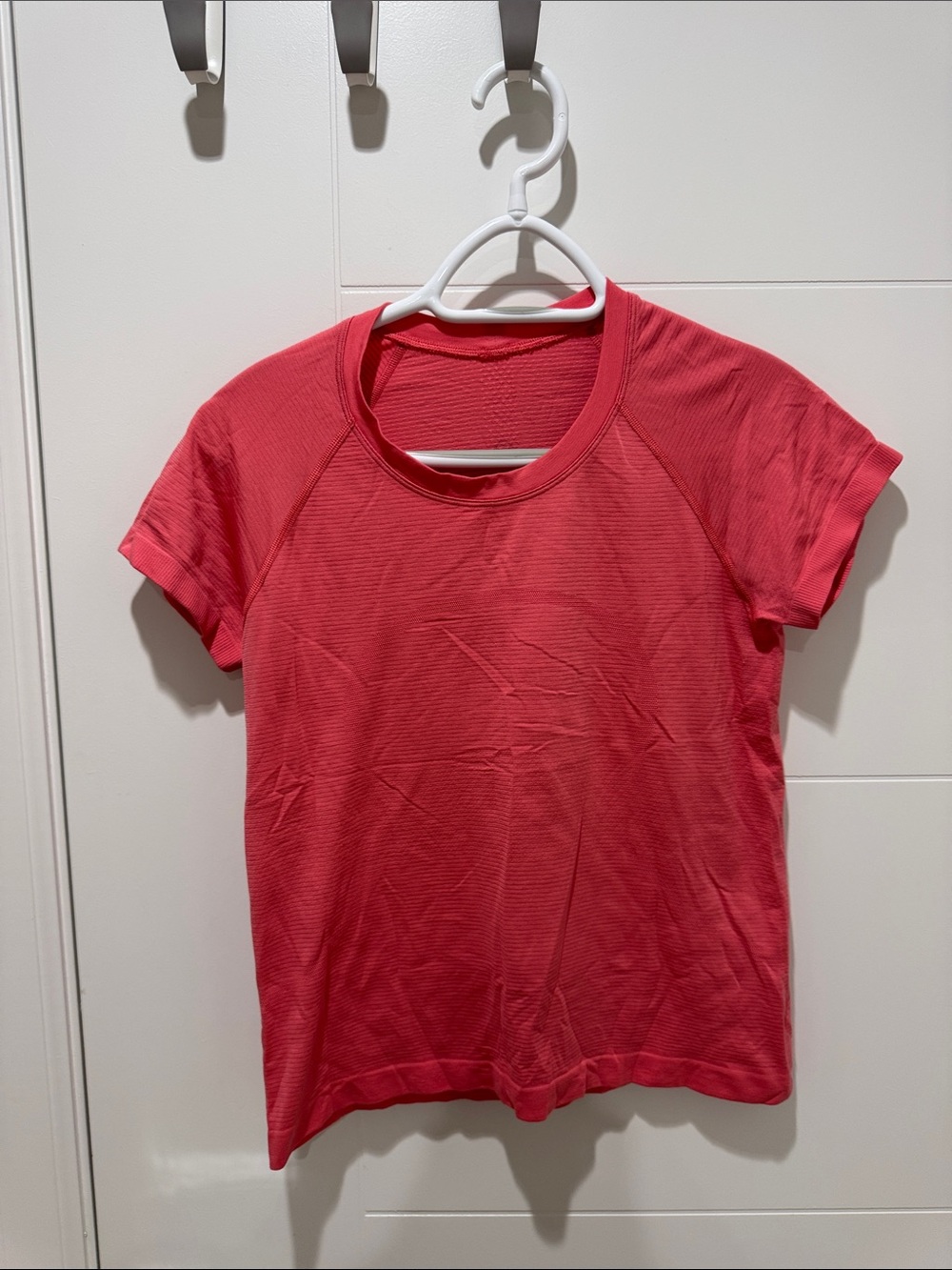 Lululemon Women’s Short Sleeve workout Top - Coral Pink